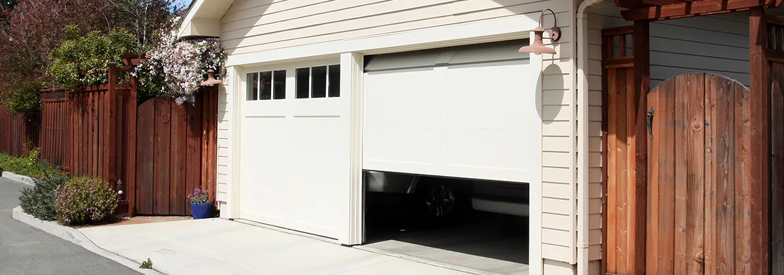 Fix Metal Garage Door Jerking in Edwardsville, Illinois